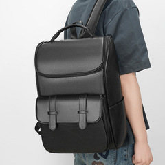 シンプルでファッション的な韓国のランドセルの街頭の潮の男性の皮質のランドセルの屋外のレジャーのリュックサックの学生のランドセルの潮