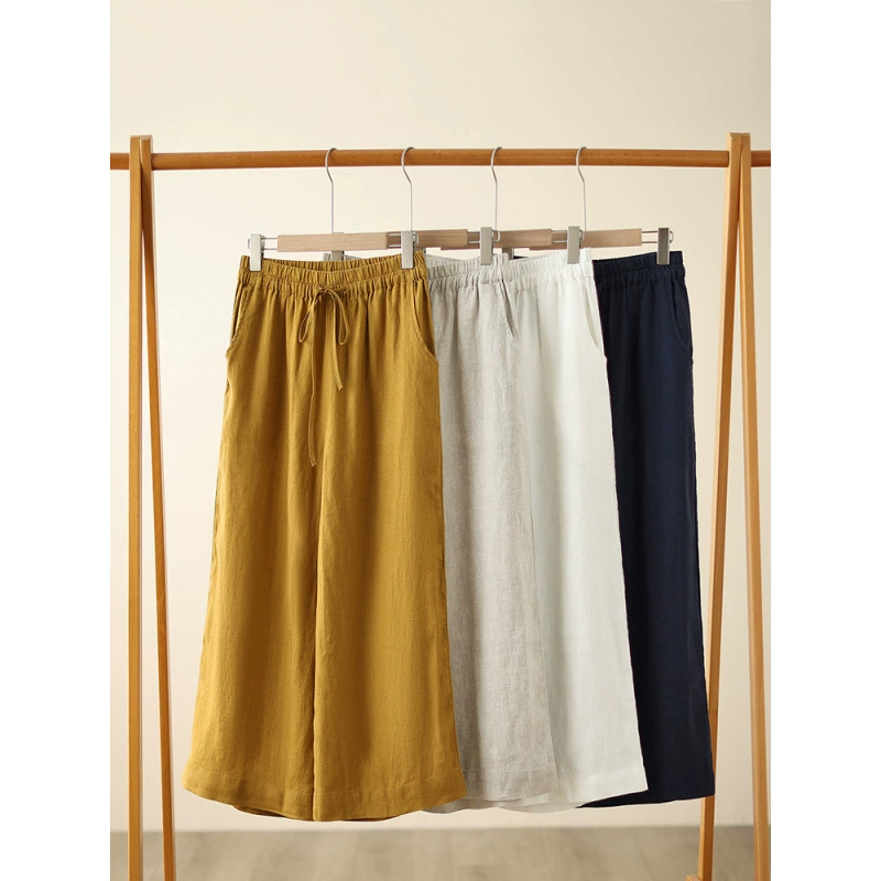 Настоящая фотография натуральных и аутентичных дышащих льняных брюк, художественных однотонных прямых брюк с эластичной резинкой на талии в стиле ретро для женщин.