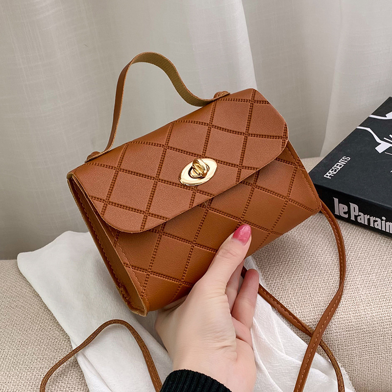 Fresco bolso de reducción de edad2025 primavera y verano nuevos productos en relieve de diamante bolso de hombro de mujer bolso mayorista de comercio exterior