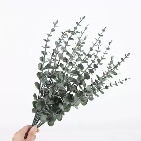 Small branches of dark green powder