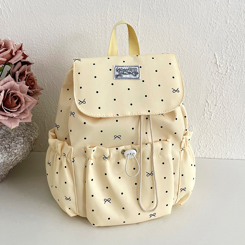 Japanese-style bowknot polka dot backpack for women, college style, versatile school bag for college students, casual travel small backpack