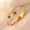 Double black and white shell four-leaf clover golden