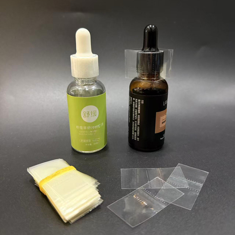 精油瓶封口膜pvc热缩膜软管瓶子带撕线塑封膜透明两头通收缩膜