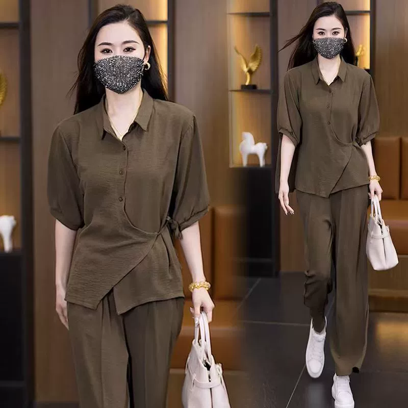 Модный женский костюм больших размеров, лето 2025, новый стильный топ с короткими рукавами, уменьшающий возраст, и прямые брюки, комплект из двух предметов