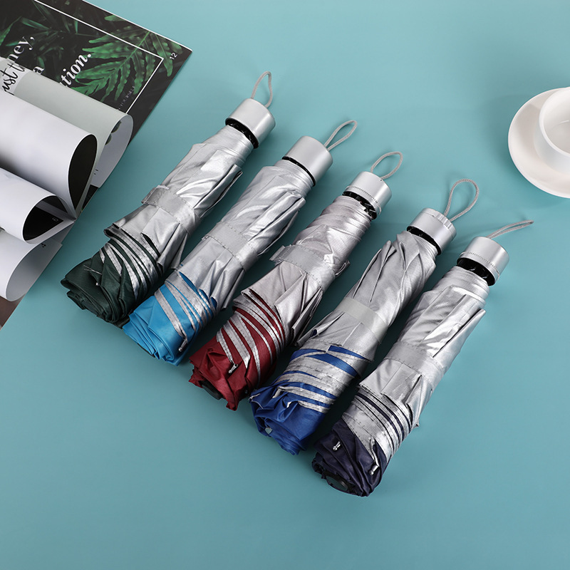 Factory spot super cheap umbrella umbrella rain and shine dual-use three-fold silver rubber umbrella sunscreen multi-color gift umbrella