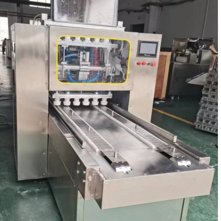 供应蛋糕自动落纸杯机 纸杯纸托自动排放机 多款式蛋糕成型机