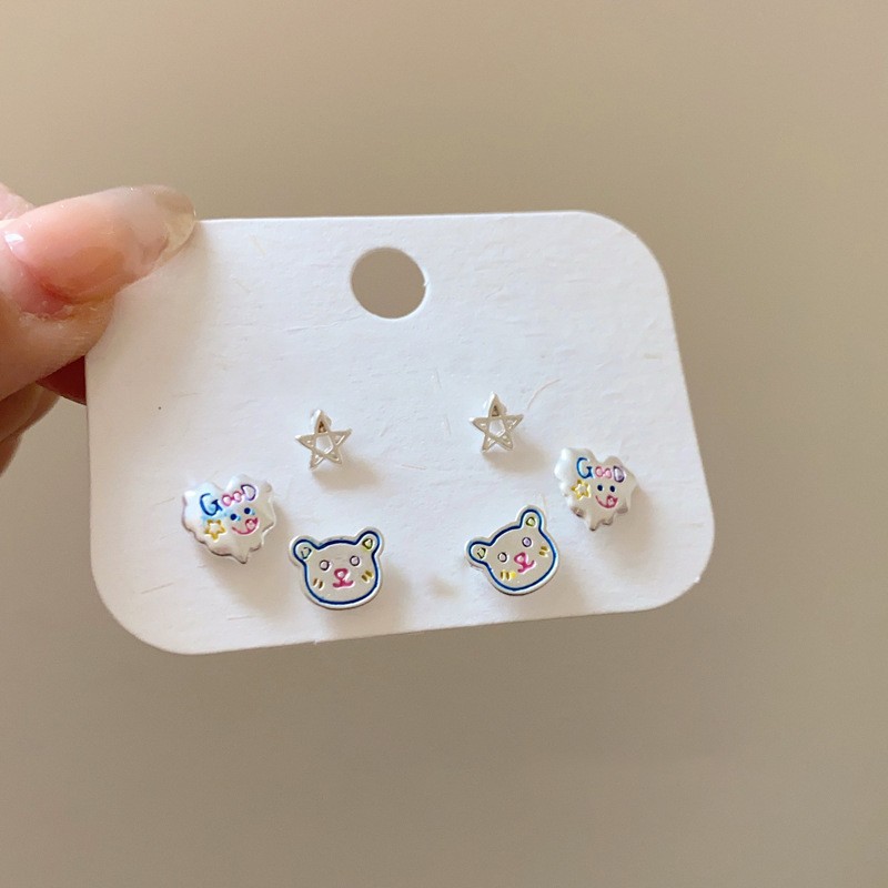 Pendientes redondos de color de aguja de plata Pendientes frescos y dulces Pendientes de todo fósforo de moda simple para mujer