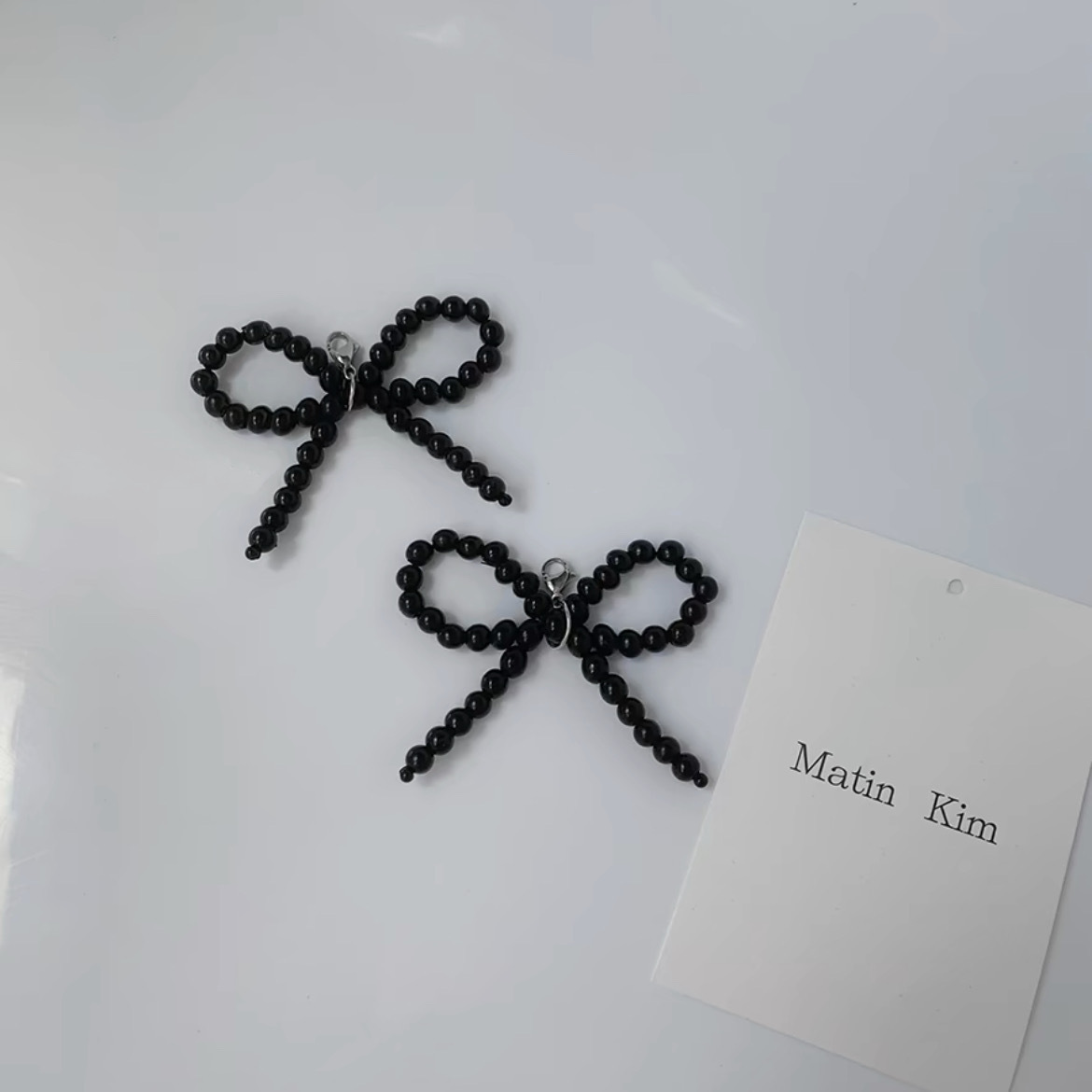 Artículo original de moda de verano arco perla botón de zapato colgante de cuentas zapatos zapatos adornamiento floral