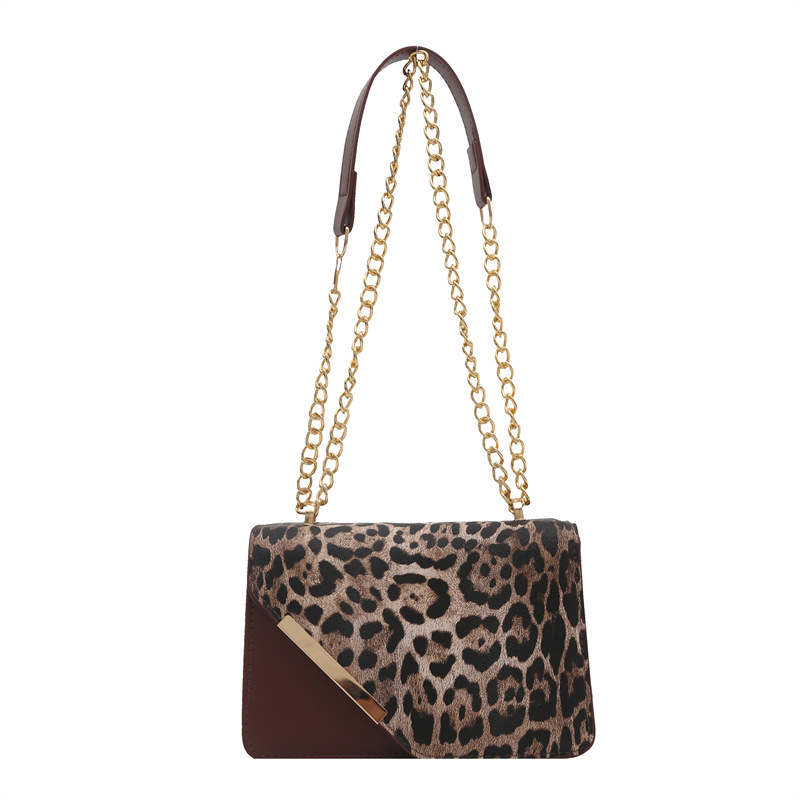2024 invierno nuevo nicho diseño leopardo bolso de hombro de moda simple bolso de brazo cadenas mochila personalidad