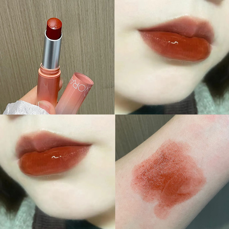HERORANGE es un lápiz labial de agua de color con una superficie de maquillaje húmeda que no es fácil de tocar con un lápiz labial feminino tierno.