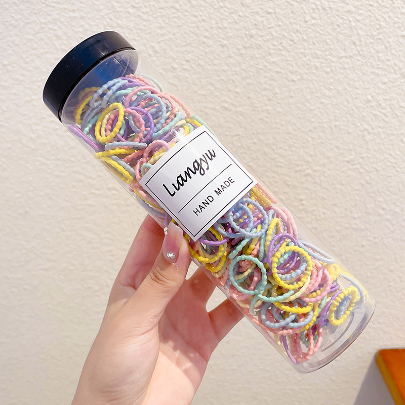 Bebés color caramelo de alta elasticidad pulgar anillo de cabello de niñas adornamiento de cabello de dopamina no daña banda de goma de cabello