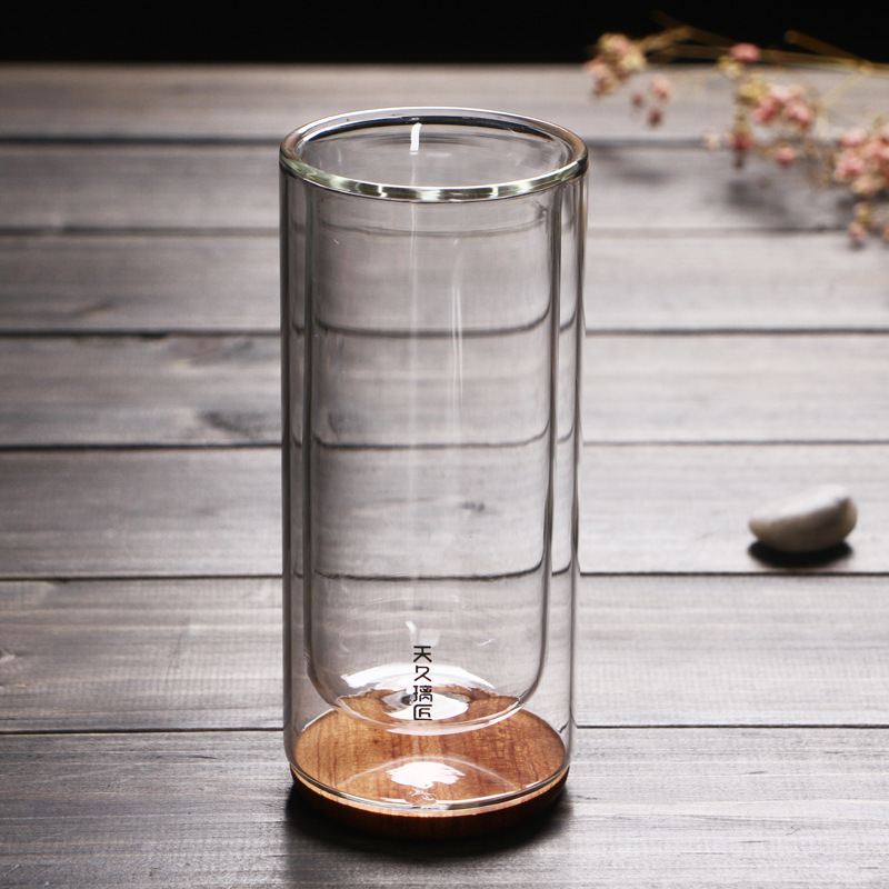 Vidrio transparente grueso resistente al calor inferior de madera aislamiento térmico de doble capa taza de té verde taza de agua creativa flor taza de té Tianjiu glass