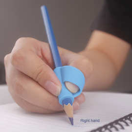 工厂现货硅胶握笔器 拇指款硅胶笔套 儿童学生矫正握笔姿势硅胶套