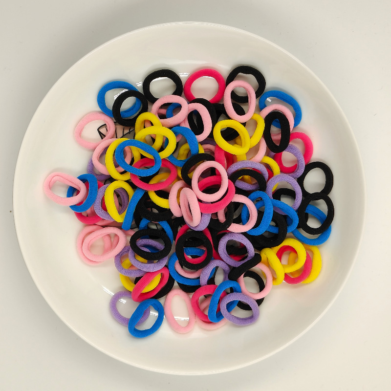 Color de caramelo de alta elasticidad pequeña toalla anillo de cabello bebé anillo de cabello no daña cabello atado fábrica de cabello al por mayor