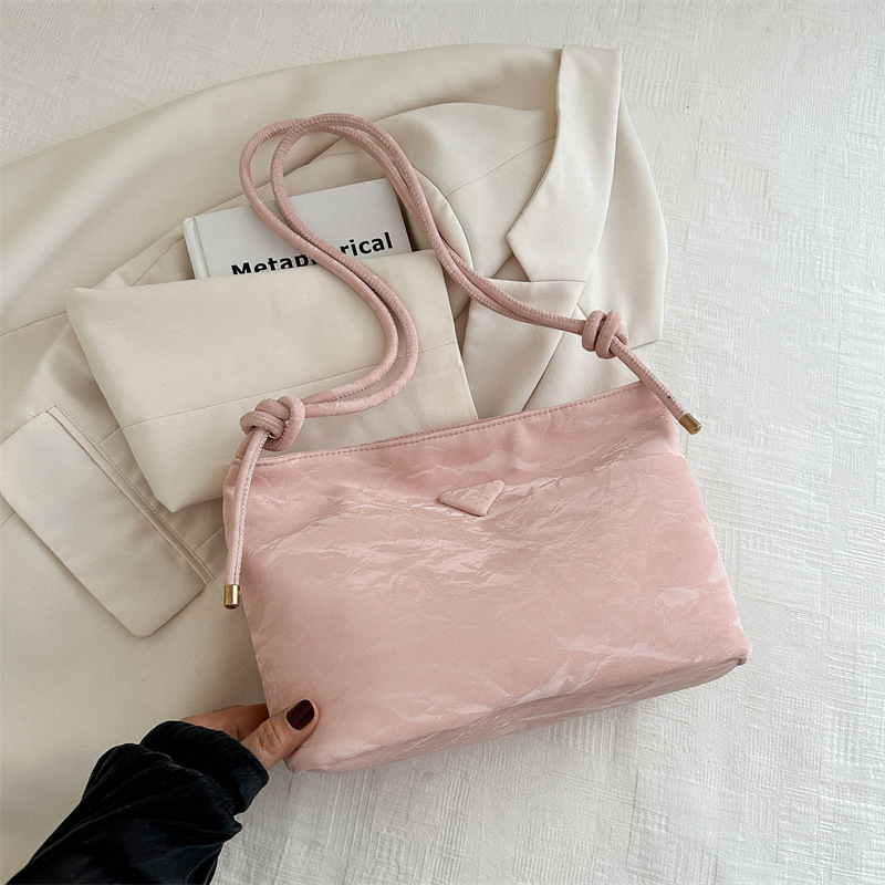 Bolsos de cercanías de gran capacidad para mujer 2024 primavera y verano nueva moda nicho textura de alta gama bandolera bandolera