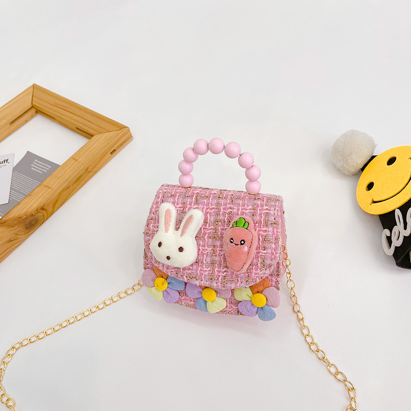 2022 nuevos niños bolso de hombro crossbody Chanel estilo niñas bolsa perla portátil accesorios de dibujos animados bolsa de desgaste