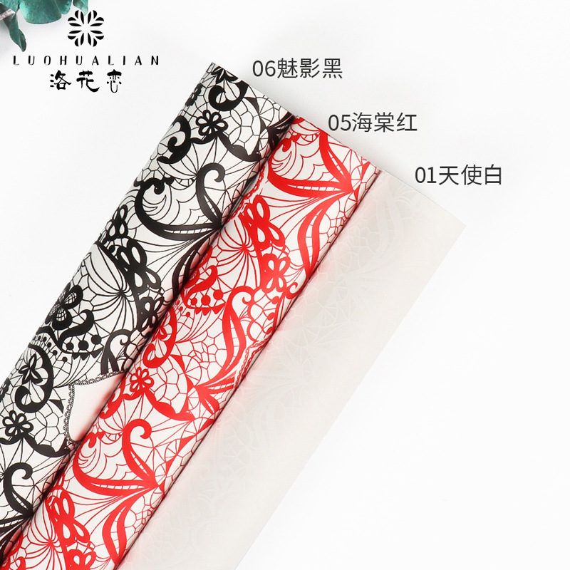 Al por mayor nuevo tipo de flores amor hansu papel floral material de embalaje de flores engrosado patrón impermeable ramo de papel de embalaje