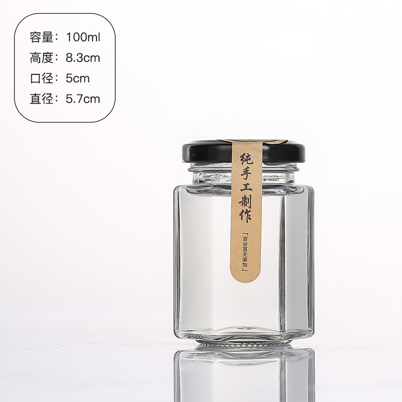 Hexagonal de vidrio enlatado sellado de grado alimenticio con tapa vacía un kilo de pasta de limón, miel, pimienta, botella de mermelada