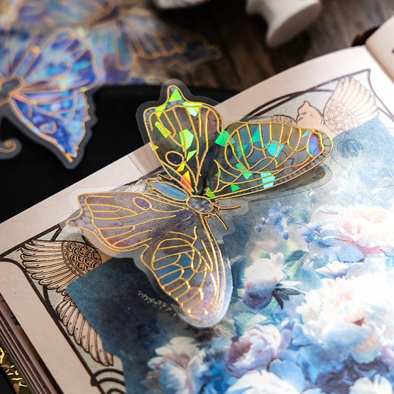 PET láser estereoscópico oro pegatinas bolsa mariposa retrógrada cuentas de mano tarjeta de flujo lino material cuentas de mano DIY pegatinas decorativas