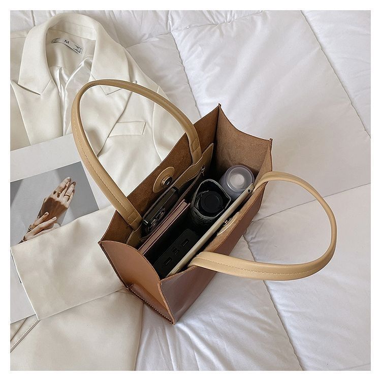 2024 New Bags Korean Version Versatile Commuting Bags Large Capacity Portable Tote Bag Temperament Popular Women’s Bag Vertical Style_voghion.com