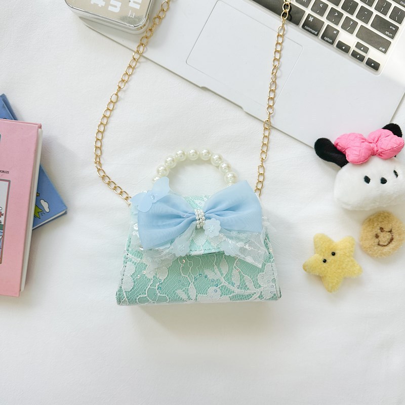 Bonito pequeño viento de la princesa viento bolso de perlas bolso de mano bolso de hombro para niños arco