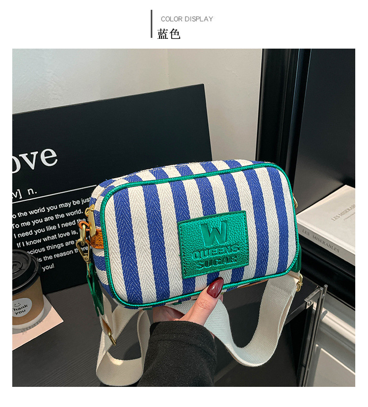2026 nuevo fresco bolso de verano ancho cinturón de hombro mochila de hombro de vacaciones de mujeres bolso de cámara a rayas