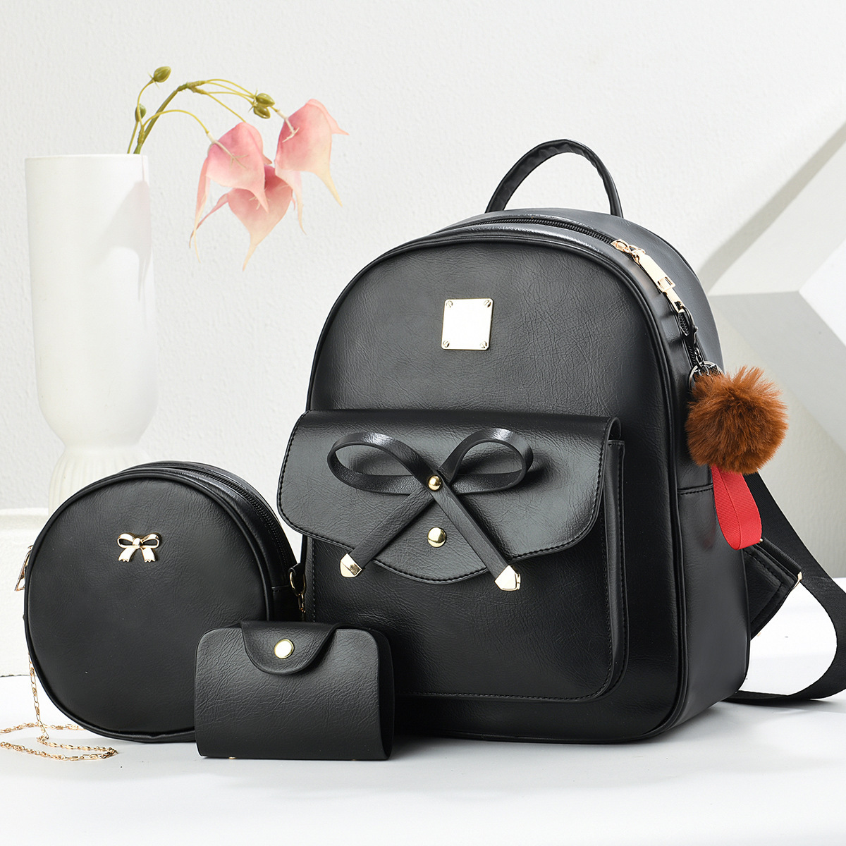 Nuevo estilo de moda de 2025 estilo coreano PU mochila pequeña multipropósito ligera de tres piezas mochila para mujeres