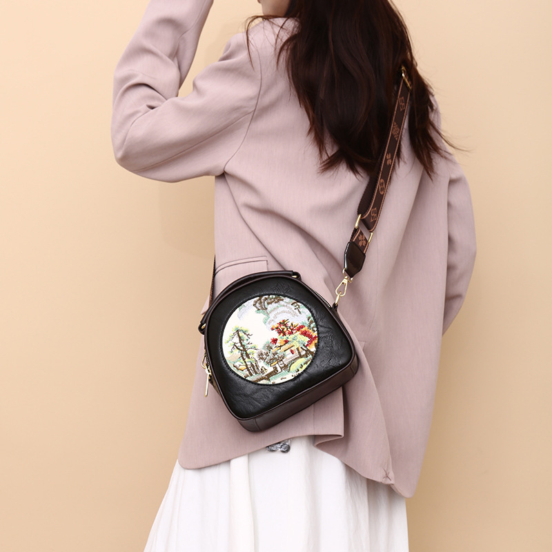 Transfronterizos ocio de cuero suave bolsas redondas versátiles exquisitas retro bolsas de hombro inclinadas de gran capacidad nuevas bolsas de mamá chinas