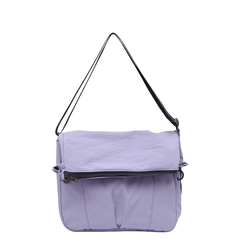 Bolso de lona de moda coreana 2025 verano nuevo bolso femenino estilo universitario bolso de hombro casual bolso de mensajero de gran capacidad marea