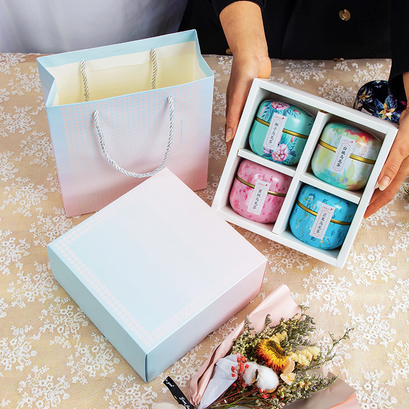 Triangle bag scented tea gift canned White Peach Peach oolong tea gift box strawberry black tea osmanthus tea hand gift Festival Triangle bag scented tea gift canned White Peach Peach oolong tea gift box strawberry black tea osmanthus tea hand gift Festival