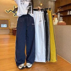 アメリカ式衝突色速乾スポーツパンツドーパミンレジャーストライプゆるいカジュアルパンツ高街レトロ通気モップ