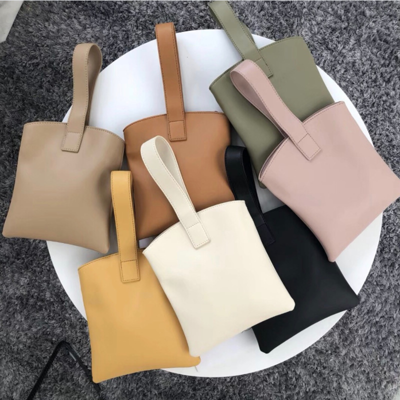 简约个性手腕包韩版软面小巧手提包纯色手拿PU包女士手机包定制