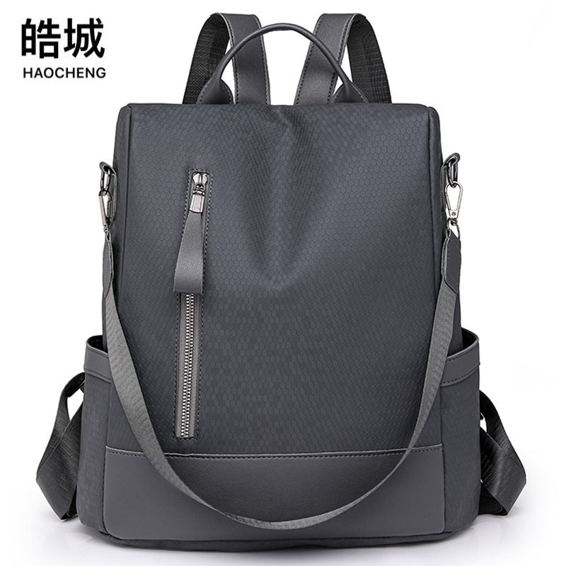 Bolso mujer 2024 verano nuevo color sólido señoras antirrobo mochila de cuero suave simple retro mochila de viaje de viaje