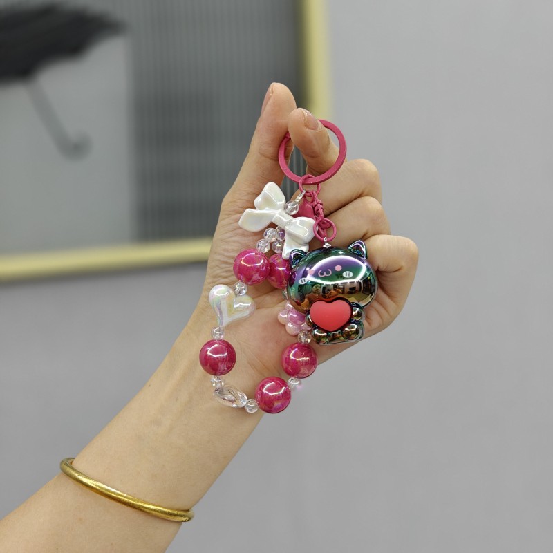 Galvanoplastia abrazo amor oso con cuentas llavero colgante acrílico muñeca colgante garra máquina muñeca regalo al por mayor