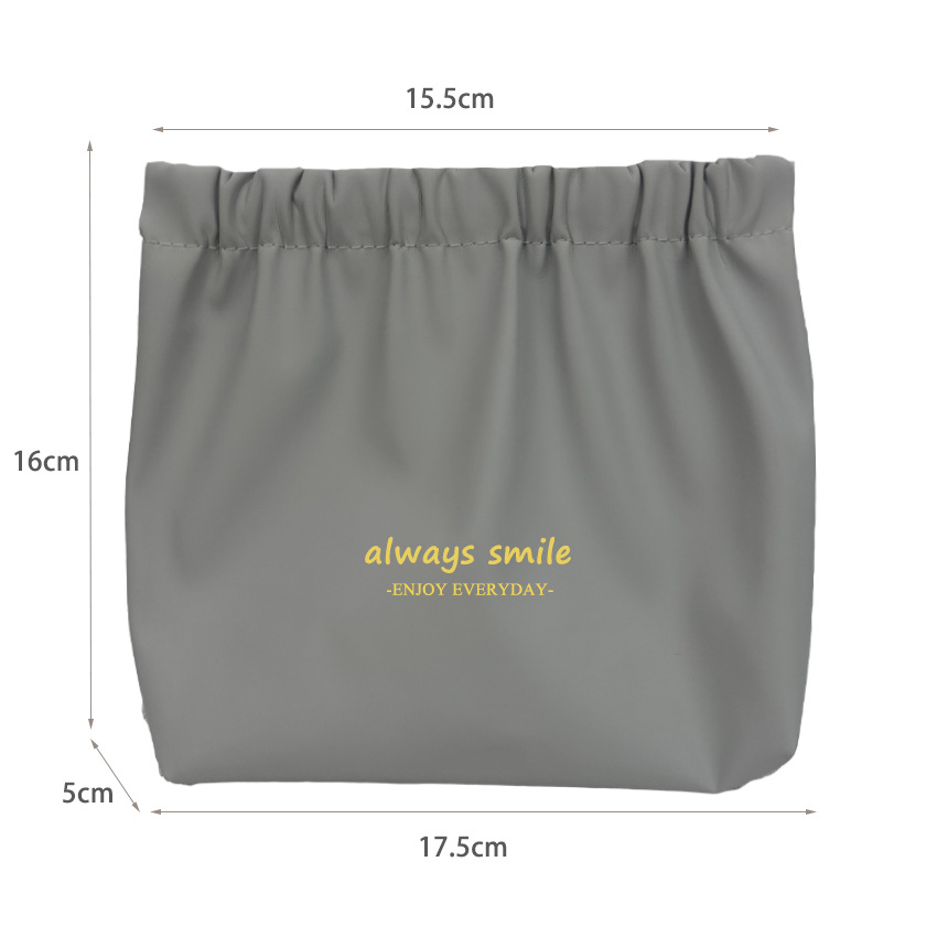 Nuevo impermeable pu bolsa de cosméticos lápiz labial de las mujeres sanitaria servilleta metralla bolsa de almacenamiento portátil cable de datos auriculares bolsa de almacenamiento