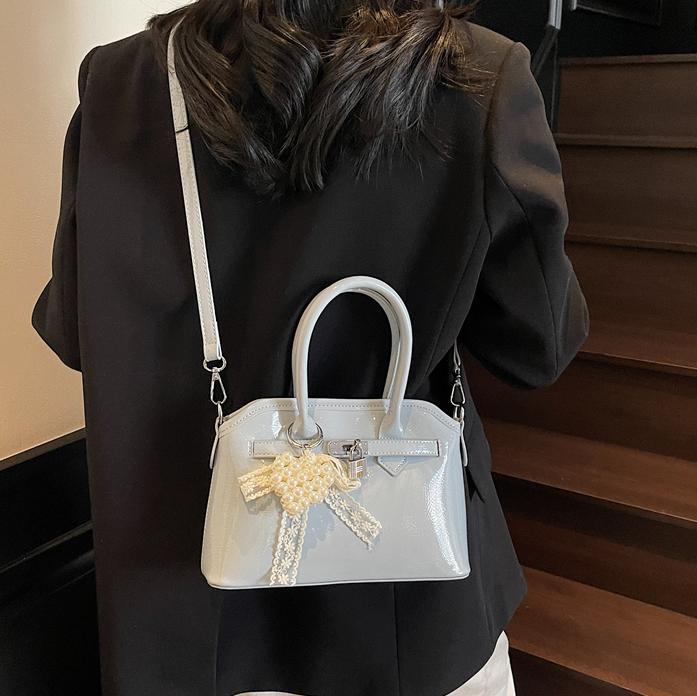 Bolso de concha de moda de verano transfronterizo para mujer 2025 nuevo bolso de hombro de estilo occidental de todo fósforo bolso de mensajero de moda de alta gama