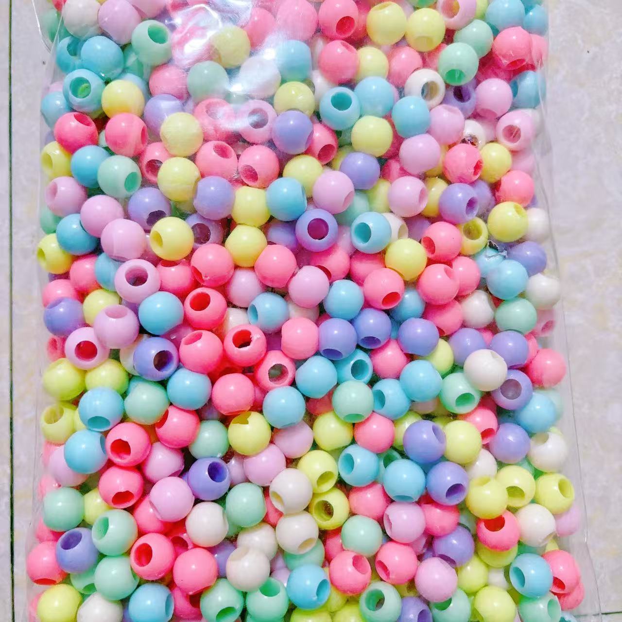 2025 Nuevas cuentas de cabello baratas en bolsa nuevas cuentas de plástico de color primavera diy gran agujero image 33
