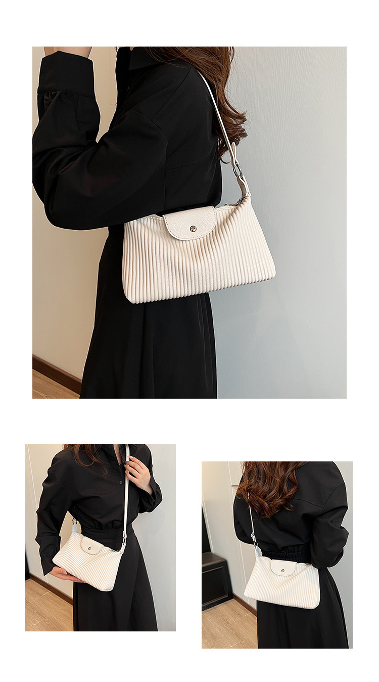 Niche design pleated striped 2024 new women's versatile and simple single shoulder pillow crossbody armpit bag_voghion.com