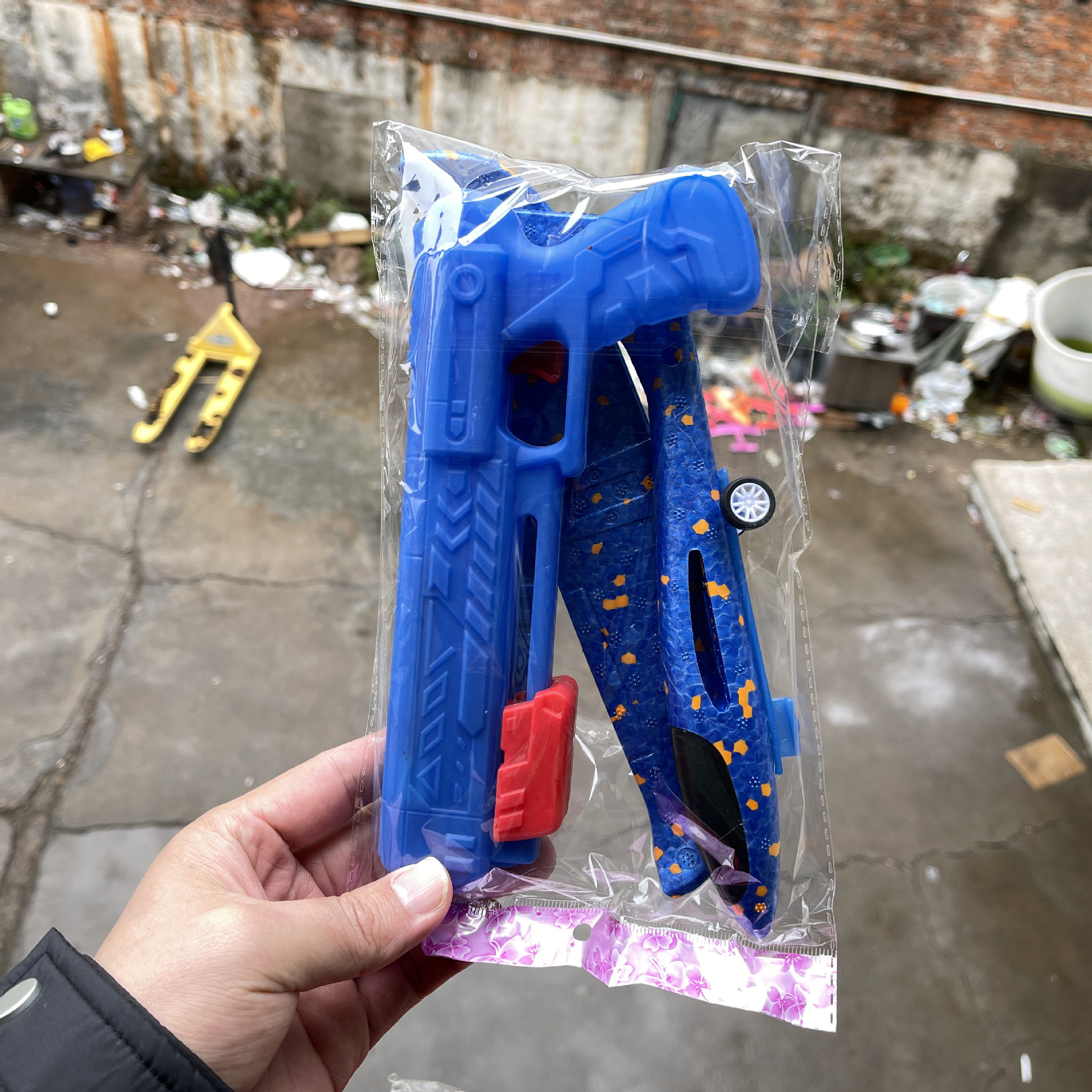 Explosiones transfronterizas aviones de espuma catapultadas pistolas de mano juguetes al aire libre para padres e hijos aviones con lámparas