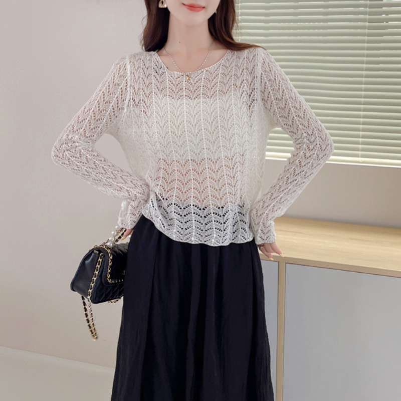 2025 moda verano nuevo estilo diseño de punto sentido versión coreana hueca todo fósforo fino jersey de manga larga camisa de protección solar top