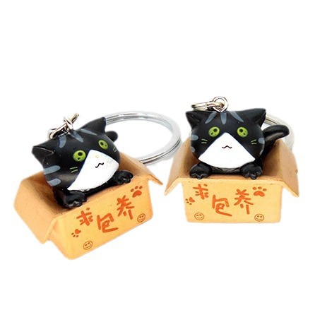 Gato de dibujos animados llavero colgante lindo gato muñeca estudiante adornos campus tienda suministro al por mayor