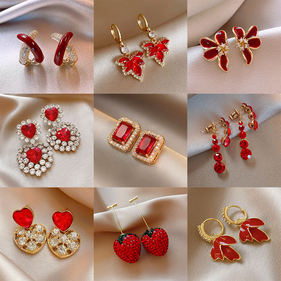 Diamante rojo-incrustado hoja de arce pendientes geométricos Luz de invierno de lujo de alto grado pendientes de Año Nuevo nicho pendientes de todo fósforo al por mayor