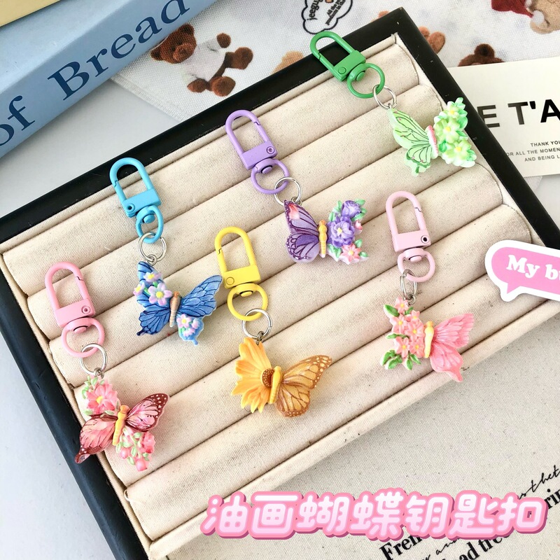 Oil painting butterfly keychain resin pendant, cute cartoon forest-themed accessory for girls' bags