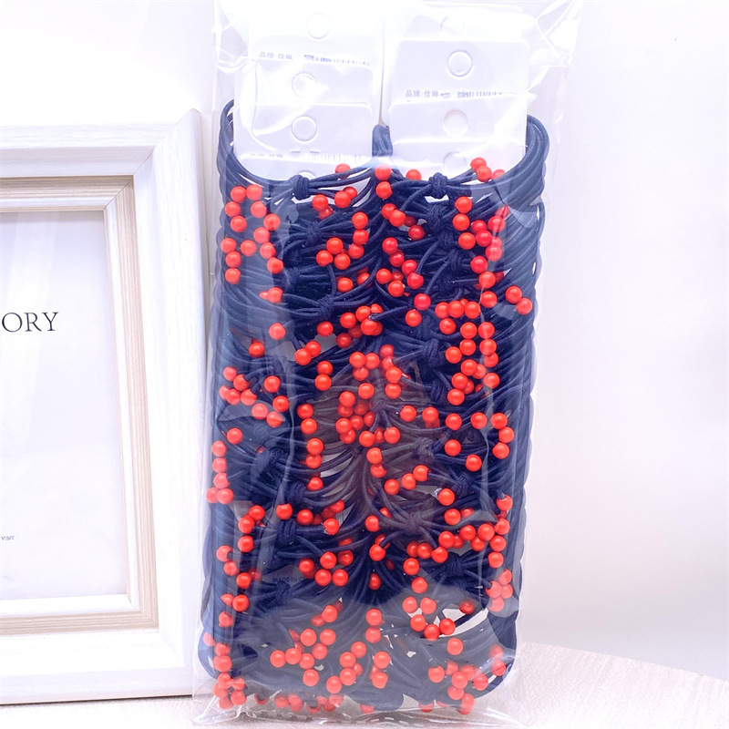 La versión coreana de la tarjeta colgante de té leche adornos de cabello nudo cinta de cuentas de cuerdas de alta elasticidad cuatro en uno correa de goma 2 tienda