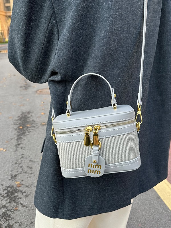 Caja de mano retro bolso cuadrado para mujeres 2025 comercio exterior transfronterizo nueva moda de color contrastante empalme mochila de hombro