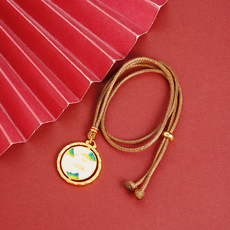 La antigua herencia de China viento verde montaña agua verde nubes auspiciosas puede girar oro de arena vietnamita joyería de latón retro al por mayor