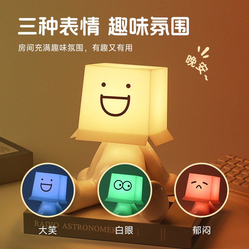 Transfronterizo venta caliente tímidos niños RGB lámpara de escritorio iluminación multicolor lindo hombre sentado USB carga