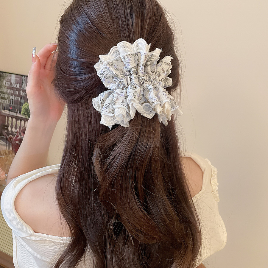 47# Coletero color blanco hueso.