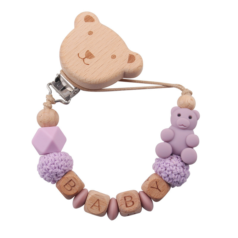Nuevos productos para la madre y el bebé, clips de oso de haya, juguetes de dientes apretados para bebés, cadena de chupete de oso de oso de animales de dibujos animados
