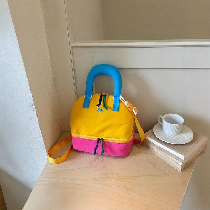 Color-block nylon Boston bag, new style, large capacity, can be carried by hand or worn as a crossbody bag, lightweight, suitable for gym, travel, and commuting